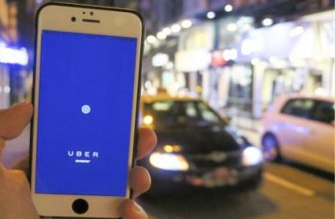 區錦新稱Uber解決搭的士難
