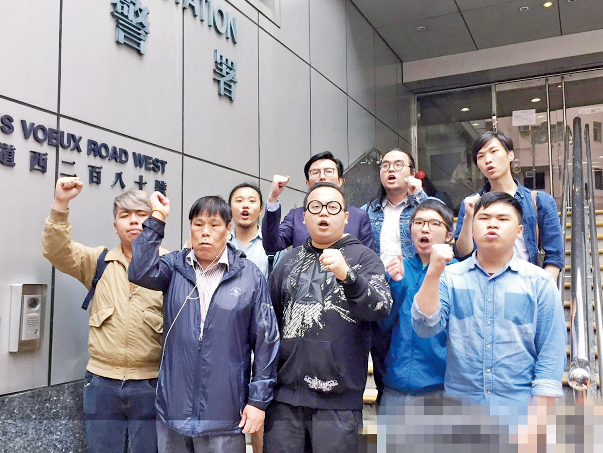 香港眾志社民連九人被控