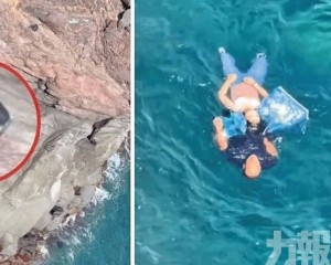 咬住落水女子頭髮撐到救援