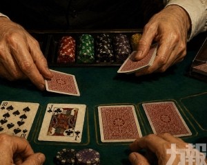 三中國客輸逾五萬美元